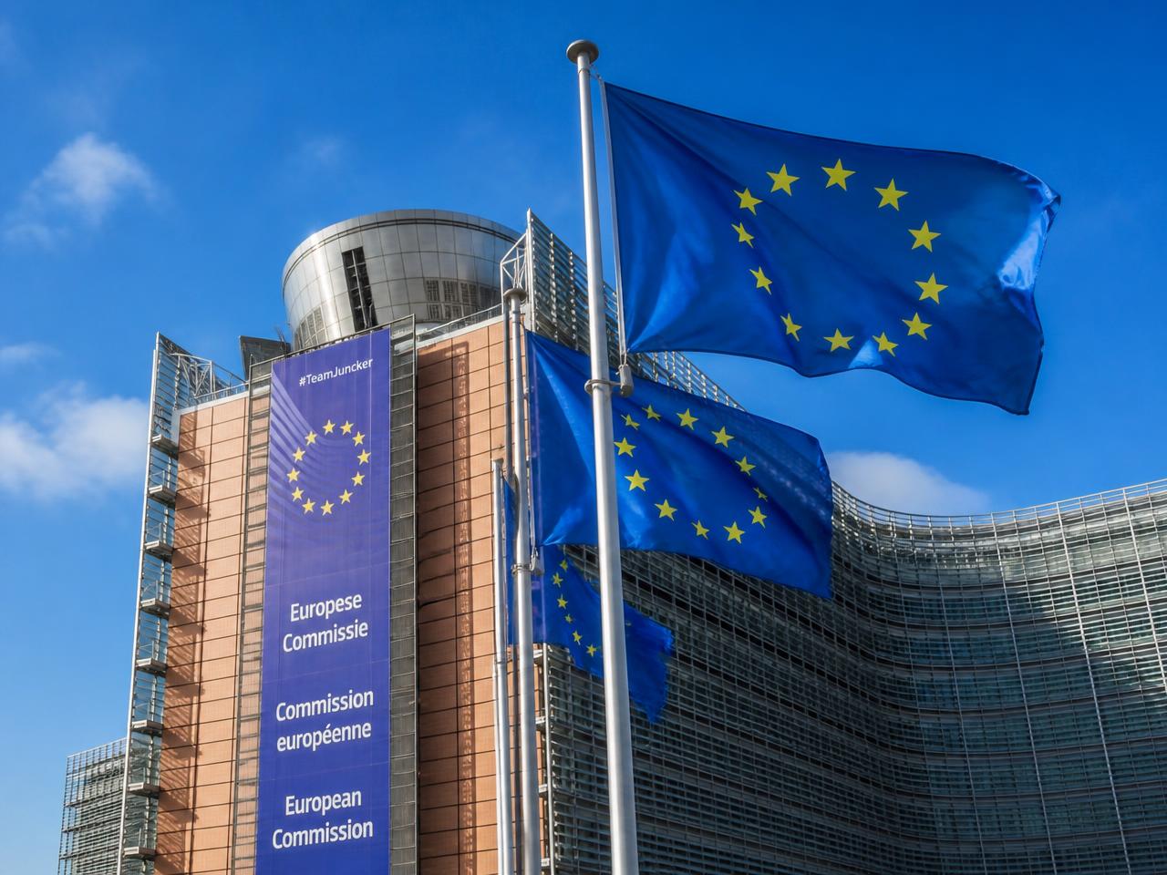European Union flags in front of the European Commission building in Brussels